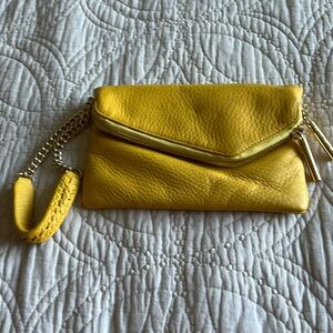 Henri Bendel yellow wristlet with gold chain